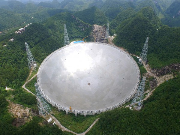 The five hundred Aperture Spherical radio Telescope FAST is located inside a natural basin in the southern Guizhou province.