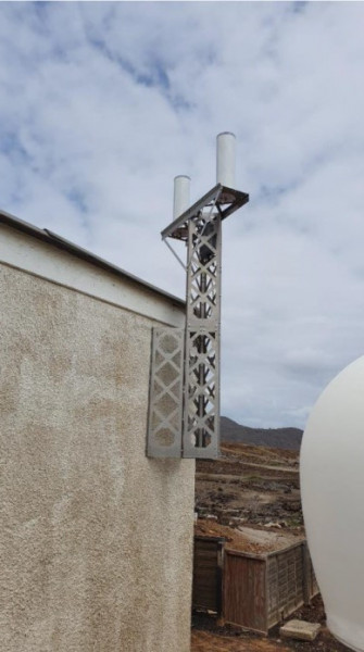 The station is attached to the wall of the building housing the generators